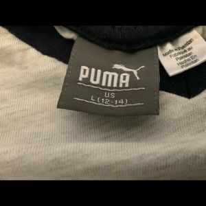 A gray Puma shirt